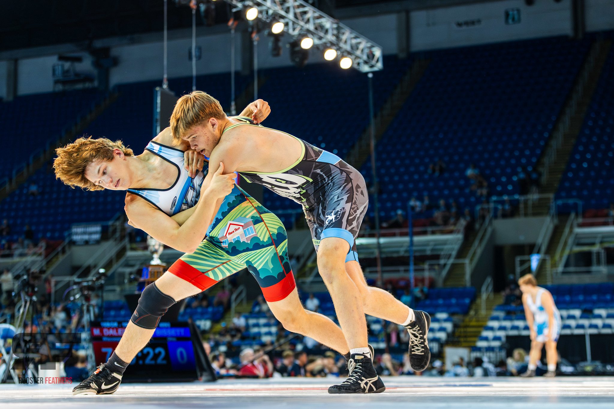 Two wrestlers locked up at the 2026 Junior Nationals in Fargo